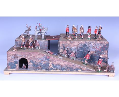 A collection of lead soldiers and accessories, including a Britains No. 28 Mountain Artillery with Mule Team and Quick Firing