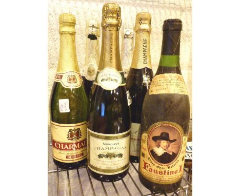 Five bottle of mixed sparkling wine and a bottle of Faustino Rioja sealed with contents