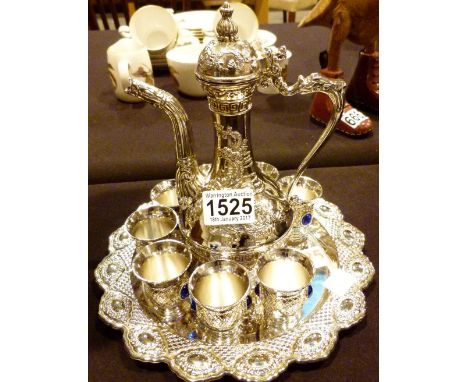 Chinese white metal tea service  CONDITION REPORT: At lotting there's 8 cups, good condition, no apparent damage or restorati