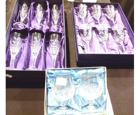 Three boxed sets of Edinburgh crystal  glasses, champagne, wine and brandy 