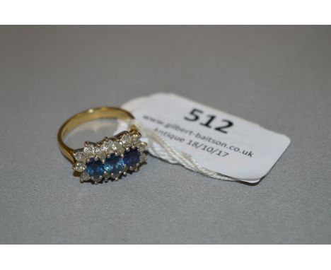 18 Carat Gold Ring set with Blue & White Stones 