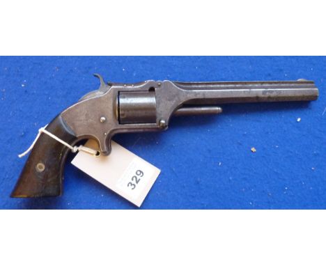 A Smith & Wesson .32 rimfire revolver, serial no. 52138, octagonal 6" barrel with raised rib marked 'Smith & Wesson - Springf