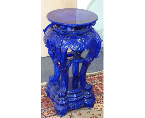 ADDED LOT    A large late-19th century ceramic Jardiniere Stand modelled as a Chinese table-on-stand, overall cobalt blue gla