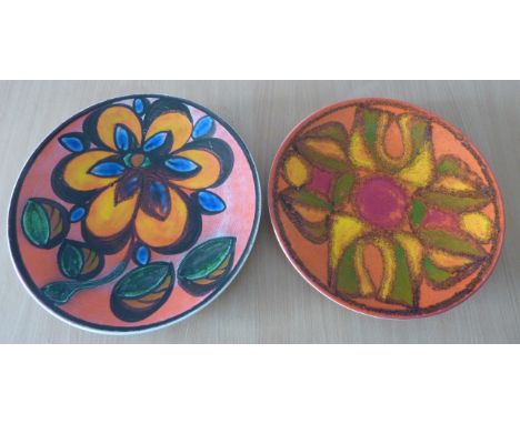 ADDED LOT    Two Poole Studioware Chargers, the larger decorated with a large orange flower; 36cm diameter    CONDITION REPOR