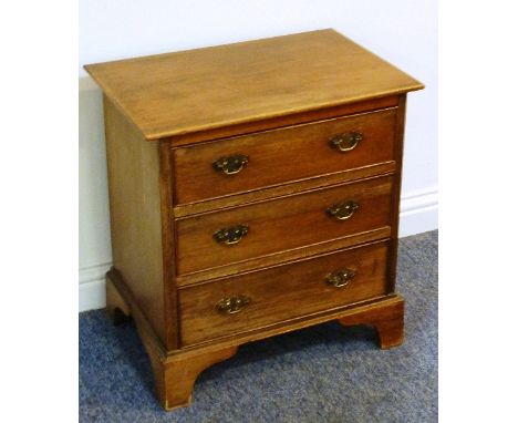 A Georgian style mahogany three drawer Chest on bracket feet 
