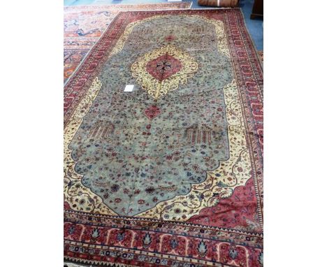 A very large hand knotted Turkish Sparta carpet, Islamic style rose and cream ground lozenge against a light green ground wit