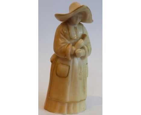 A Royal Worcester porcelain Candle Snuffer in ivory and gilt: The Abbess, date code 1910