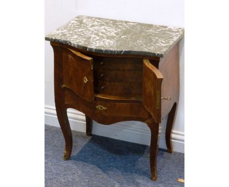 A marble topped walnut Petite Commode in Louis XV style, serpentine front with two doors opening to reveal three full width d