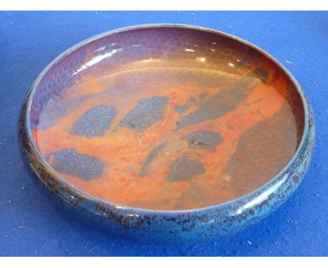 An early-20th century Royal Doulton Sung glaze pottery Bowl, mottled blue, red and orange decoration to the interior, the ext
