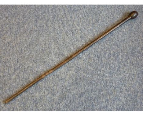 An African Tribal hardwood Knobkerrie/Walking Stick Cane (possibly Maasai), the heavy Cane having an egg-shaped club head tap