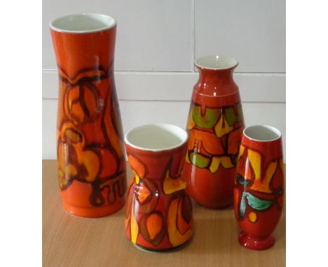 ADDED LOT    Four Poole Studioware Vases of cylindrical section, the patterns against an orange ground, the largest 39.5cm hi