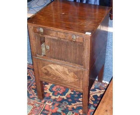 A George III period mahogany Commode, single full width drawer with lion mask and ring handles, sliding tambour below and pul