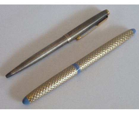 A sterling silver Parker Fountain Pen; together with another by Sheaffer, the body with textured gold plated and blue enamel 