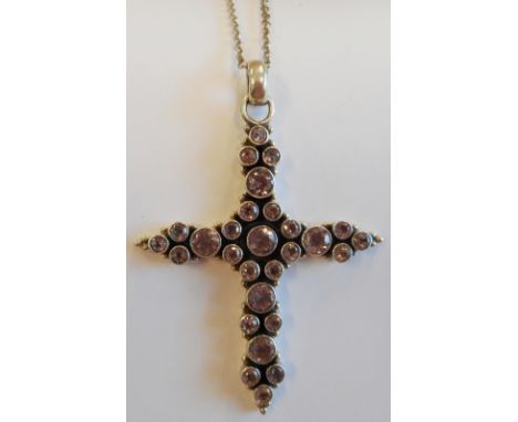 A silver stone-set Cross and Chain 