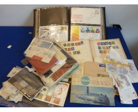 A variety of World Stamps together with the SG UK First Day Cover Album, a variety of early to late 20th Century World Stamps