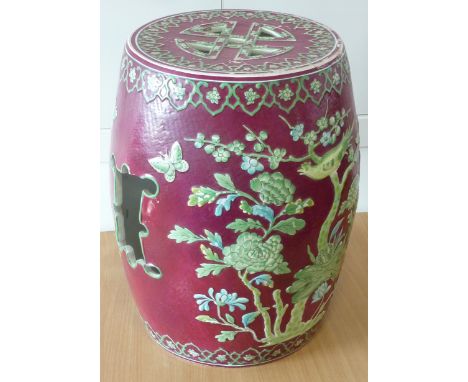 ADDED LOT    A Chinese ceramic Garden Seat, pierced Shou character to top, the sides both pierced and decorated in relief wit