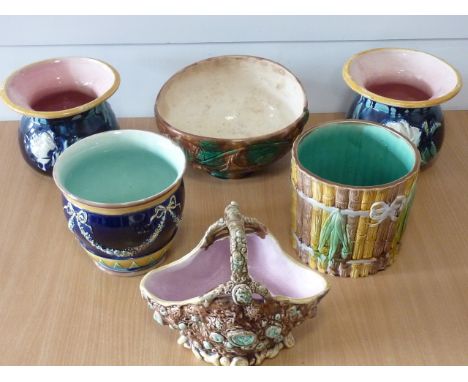 ADDED LOT    A 19th century Majolica to include two cobalt blue glaze spittoon-shaped Vases, a Planter modelled as vertical b