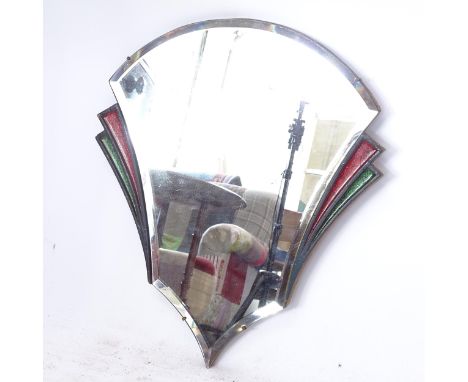 An Art Deco bevel-edge wall mirror of shaped design, L50cm 