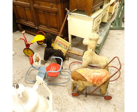 Vintage children's push-along toys, and rocking chairs, including Tri-ang 