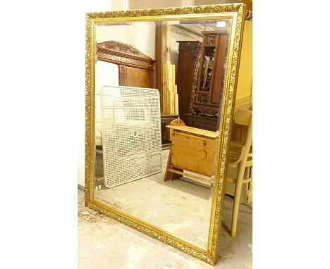 A large modern gilt-framed bevel-edge wall mirror, L128cm, H100cm 
