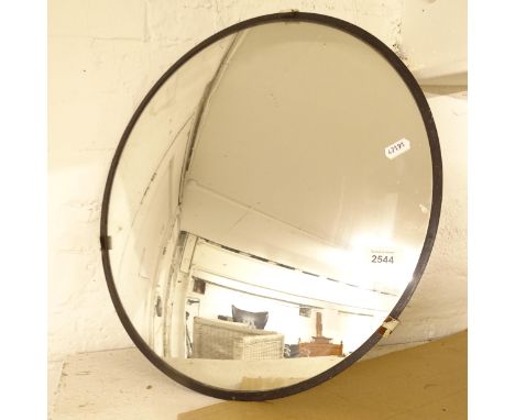 A convex driveway mirror 