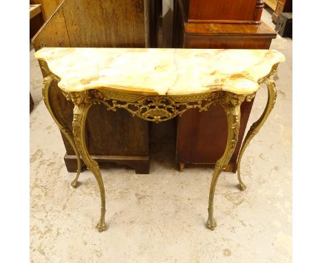 A serpentine-front console table, with a shaped onyx top, on a gilt-metal stand, W100cm, H79cm, D34cm 