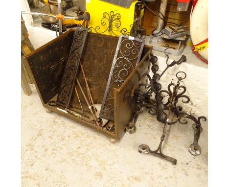 A wrought-iron chandelier, mirror,&nbsp; scrolled wrought-iron mesh fireguard, fire tools, implements, large wheeled coal bin