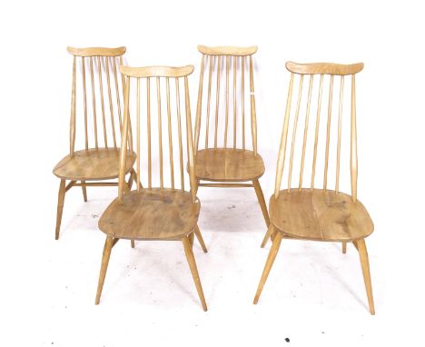 A set of 4 Ercol light elm Goldsmiths stick-back chairs 