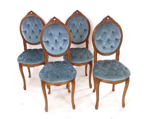 A set of 4 walnut and button-back upholstered dining chairs 