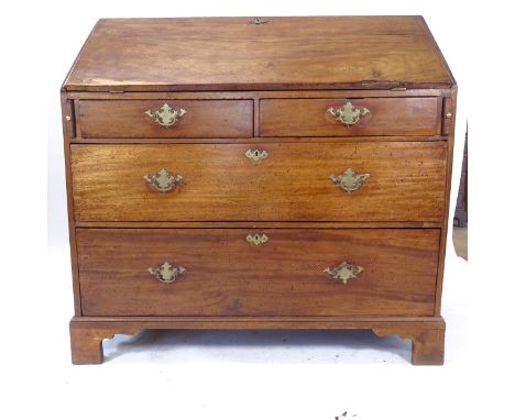A George III mahogany bureau, with 2 short and 2 long drawers, on bracket feet, W105cm 