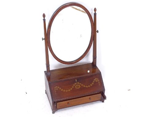 A 19th century mahogany box swing toilet mirror, with satinwood banding and marquetry decoration, the fall-front revealing a 