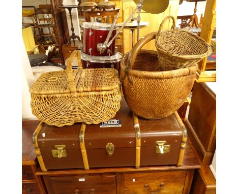 A Vintage bound travelling trunk, a wicker picnic basket, a Chinese wicker basket, and another (4) 