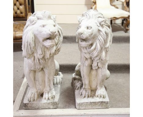 A pair of large scale weathered concrete garden lions, height 95cm 