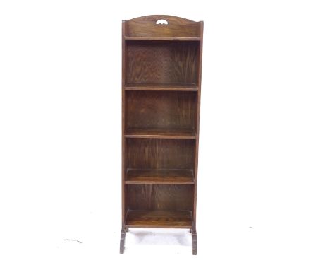 A 1920s narrow oak open bookcase, W39cm, H120cm, D32cm, shelf depth 20cm 