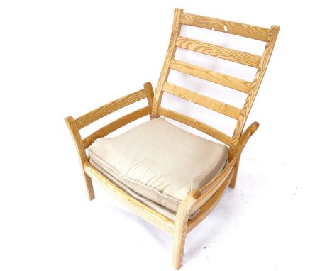 An Ercol light elm ladder-back arm chair 