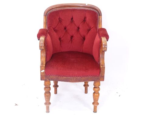 A 19th century mahogany-framed button-back upholstered armchair 