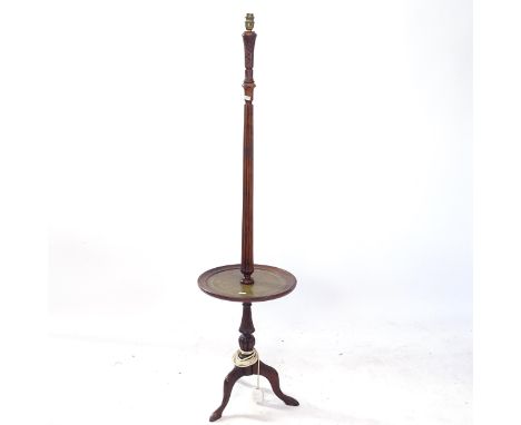 A mahogany standard lamp, with integral shelf and tripod base, height to light fitting 140cm (no shade) 