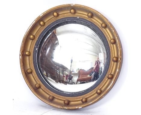 A 19th century gilt-framed convex wall mirror, W42cm 