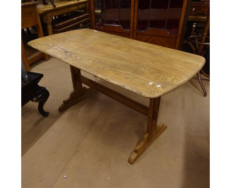 An Ercol elm rectangular dining table L137cm, H71cm, D71cm