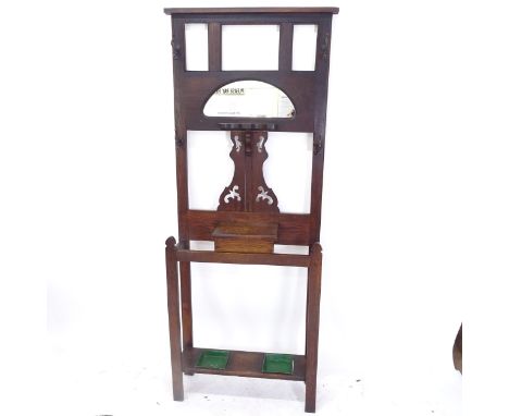 A 1920s oak mirror-back hall stand, W75cm, H200cm 