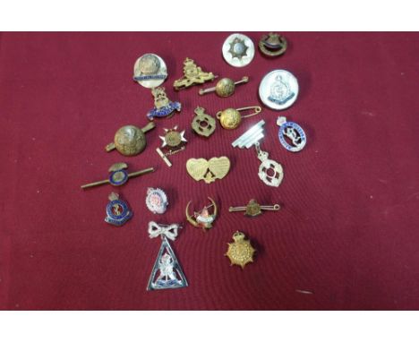 Quantity of various military related sweetheart and other lapel badges and brooches including Mother of Pearl Training Reserv