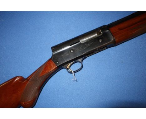 12 bore Browning A5 "Light Twelve" semi auto shotgun,  with 25 inch barrel, with engraved detail to the action, and 14 1/2 in