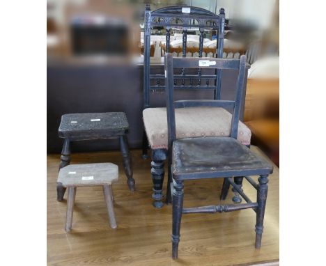 An Edwardian ebonised spindle back nursing chair, a child's ladder-back chair, a carved top stool and a small child's stool (