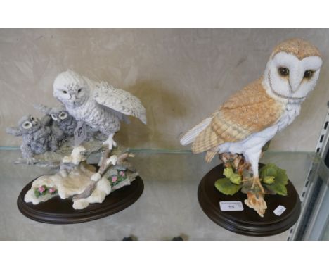 A Country Artists model of a barn owl, boxed together with a Country Artists model snowy owl with chicks, boxed (2)