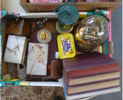 A box of collectables including clock under dome, cigarette boxes, lighter, books and a Hailwood's hanging lamp