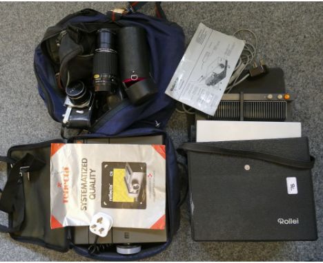 A Rollei P35 auto-focus slide projector, a reflecta slide projector, a Pentax SLR camera, Pentax ME Super SLR together with t