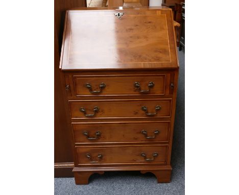 Reprodux Georgian style yew wood bureau, with fitted interior, four graduated drawers and bracket feet, 54cm wide