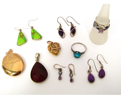 A collection of sterling silver jewellery to include four paste set rings, three pairs of gem set earrings, a 9k gold plated 