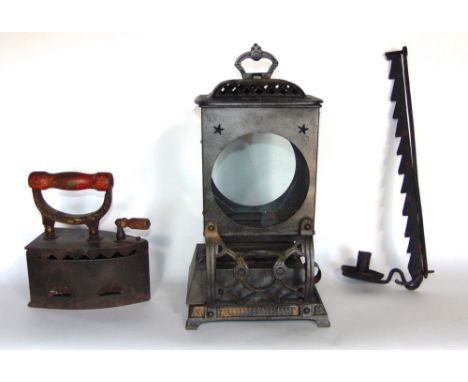 A mixed collection of iron work to include Rippingills Patent ABC Stove, further iron, and a candlestick