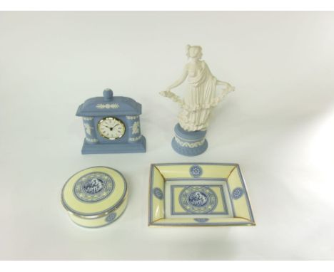 A limited edition Wedgwood blue ground Jasperware classical style female figure from the Dancing Hours collection, raised on 